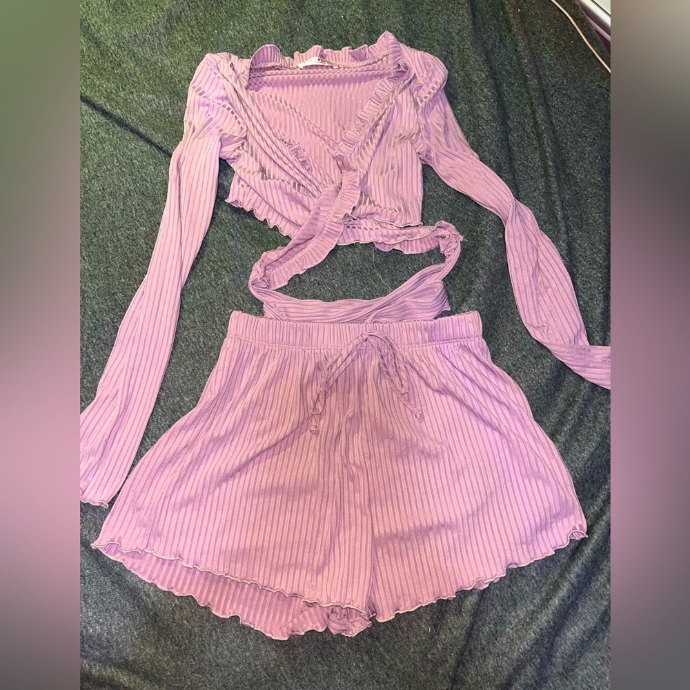 Two piece mauve colored outfit.